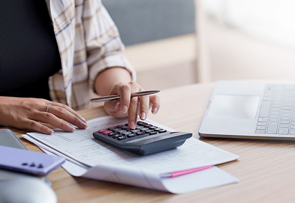 Calculating finances accounting services laptop