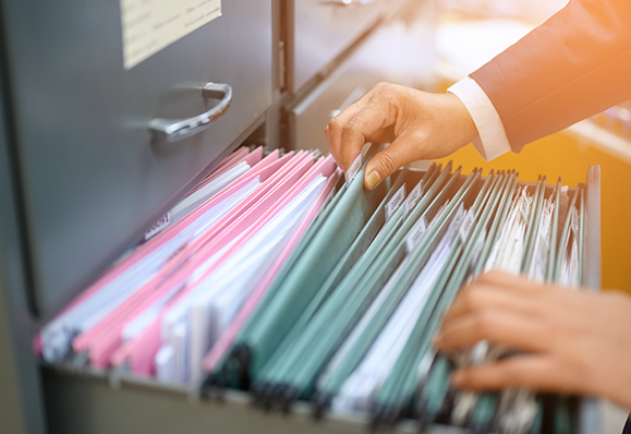 Filing cabinet with organized documents